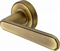 CEN1924-AT Heritage Brass Door Handle Lever Latch on Round Rose Century Design Antique Brass Finish