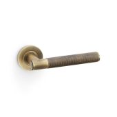 AW220AB - Alexander & Wilks Spitfire Lever Knurled on 50x6mm Rose - Antique Brass