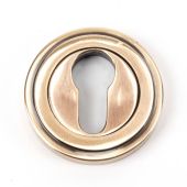46126 From The Anvil Polished Bronze Round Euro Escutcheon (Art Deco)