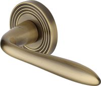 RR1752-AT Heritage Brass Door Handle Lever Latch on Round Rose Sutton Reeded Design Antique Brass finish