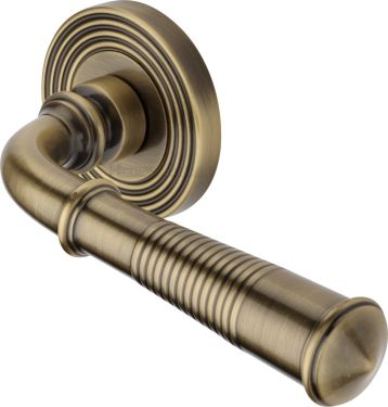 Click Here To Enlarge This Photo Of RR1935-AT Heritage Brass Door Handle Lever Latch on Round Rose Bridgetown Reeded Design Antique Brass finish