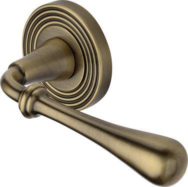Click Here To Enlarge This Photo Of RR7156-AT Heritage Brass Door Handle Lever Latch on Round Rose Roma Reeded Design Antique Brass finish