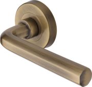 V4545-AT Heritage Brass Door Handle Lever Latch on Round Rose Octave Design Antique Brass finish
