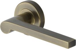 V6225-AT Heritage Brass Door Handle Lever Latch on Round Rose Metro Mid Century Design Antique Brass finish