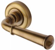 V1932-AT Heritage Brass Door Handle Lever Latch on Round Rose Colonial Design Antique Brass Finish
