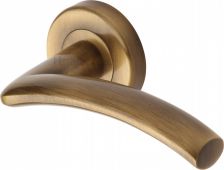 V3490-AT Heritage Brass Door Handle Lever Latch on Round Rose Centaur Design Antique Brass Finish