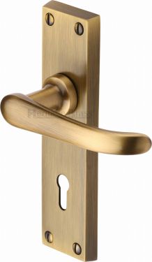 Click Here To Enlarge This Photo Of V700-AT Heritage Brass Door Handle Lever Lock Windsor Design Antique Brass Finish