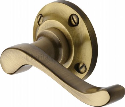 Click Here To Enlarge This Photo Of V820-AT Heritage Brass Door Handle Lever Latch on Round Rose Bedford Design Antique Brass Finish