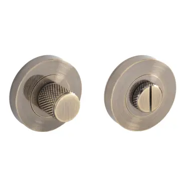 Click Here To Enlarge This Photo Of Eclipse 63285 Antique Brass Knurled Thumbturn & Release on Round Rose (Insignia Range)