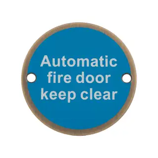 SEX1022AB - Carlisle Brass Eurospec 'Automatic Fire Door Keep Clear' Sign 76mm Antique Brass