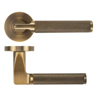 ZPA090-AB - Zoo Hardware Stanza 'Bilbao' Lever Handles on Round Rose - Antique Brass &lpar;Contract Range&rpar;