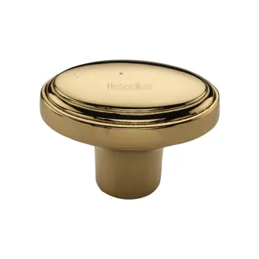 Click Here To Enlarge This Photo Of C3975-ULB Heritage Brass Cabinet Knob Stepped Oval Design 41mm Unlacquered Brass finish