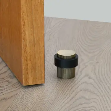 Click Here To Enlarge This Photo Of Eclipse 63775 30mm Linear Knurled Floor Door Stop - Matt Antique Brass