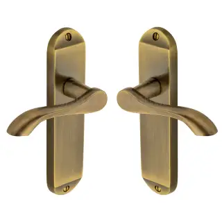 SC-7360-AZ M&period;Marcus Sorrento Door Handle Lever Latch Aurora Design Antique Brass on Zinc finish