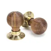 83573 From The Anvil Rosewood Mortice/Rim Beehive Knob Set - Aged Brass Roses